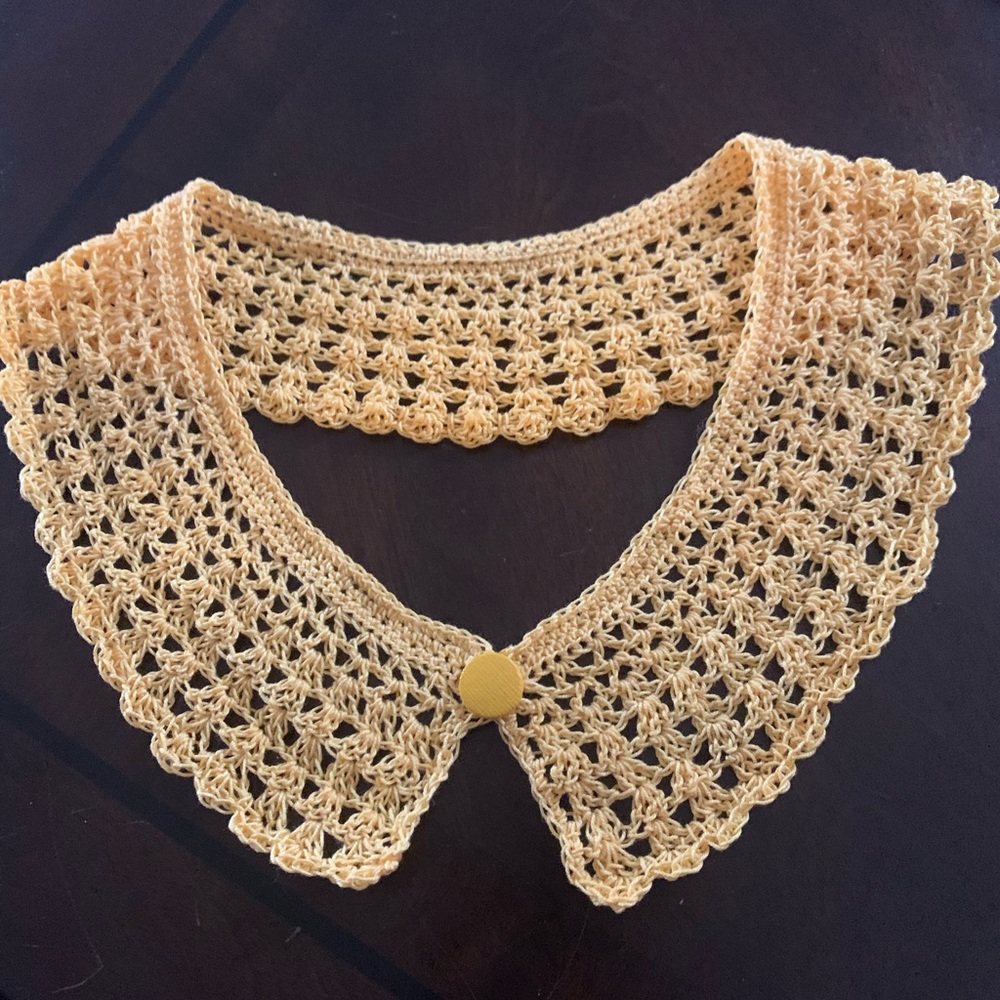 Crochet collar accent.